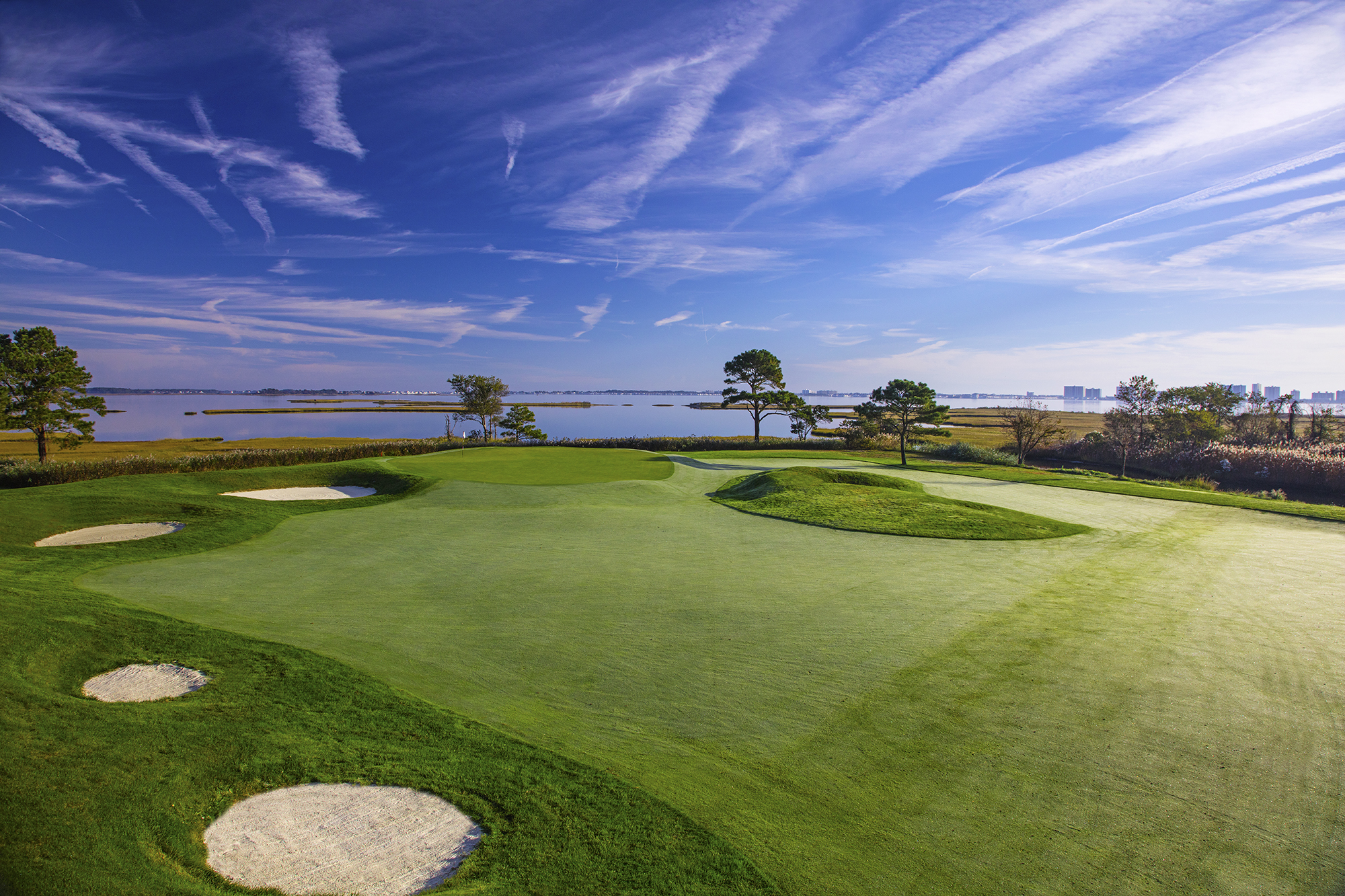 View of golf course next to the bay